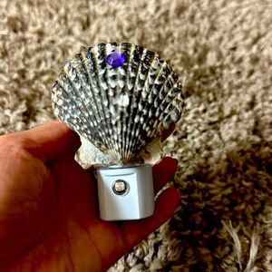 Noble Scallop night lights are an abshellute must-have in any mermaid home!